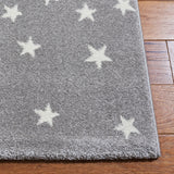 SAFAVIEH Carousel Kids Atsumi Moon Rug