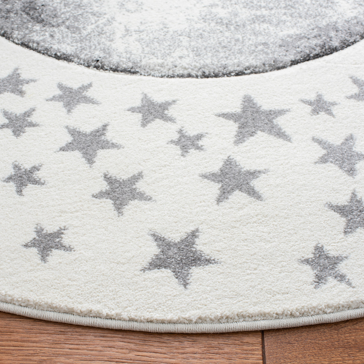 SAFAVIEH Carousel Kids Atsumi Moon Rug