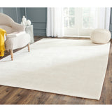 SAFAVIEH Couture Hand-knotted Tibetan Fridborg Modern Wool Rug