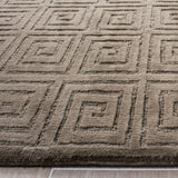 SAFAVIEH Couture Hand-knotted Tibetan Inocência Modern Wool Rug