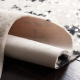 SAFAVIEH Faux Cow Hide Masuda Animal Rug