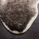 SAFAVIEH Faux Cow Hide Ngan Animal Rug