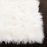 SAFAVIEH Faux Sheep Silke Skin 2.4-inch Thick Rug