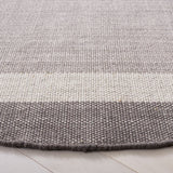 SAFAVIEH Flatweave Montauk Yurdagul Fringed Cotton Area Rug