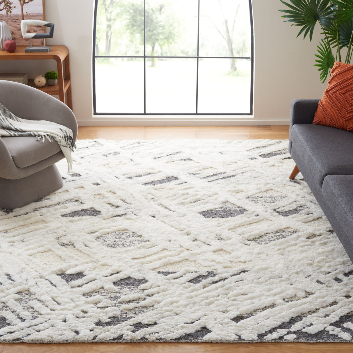 SAFAVIEH Hand-Knotted Tribeca Tomka Modern Wool Rug