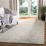 SAFAVIEH Handmade Abstract Harmanna Modern Wool Rug