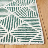 SAFAVIEH Handmade Abstract Harmanna Modern Wool Rug