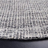 SAFAVIEH Handmade Abstract Lotje Modern Wool Rug