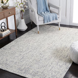 SAFAVIEH Handmade Abstract Lotje Modern Wool Rug