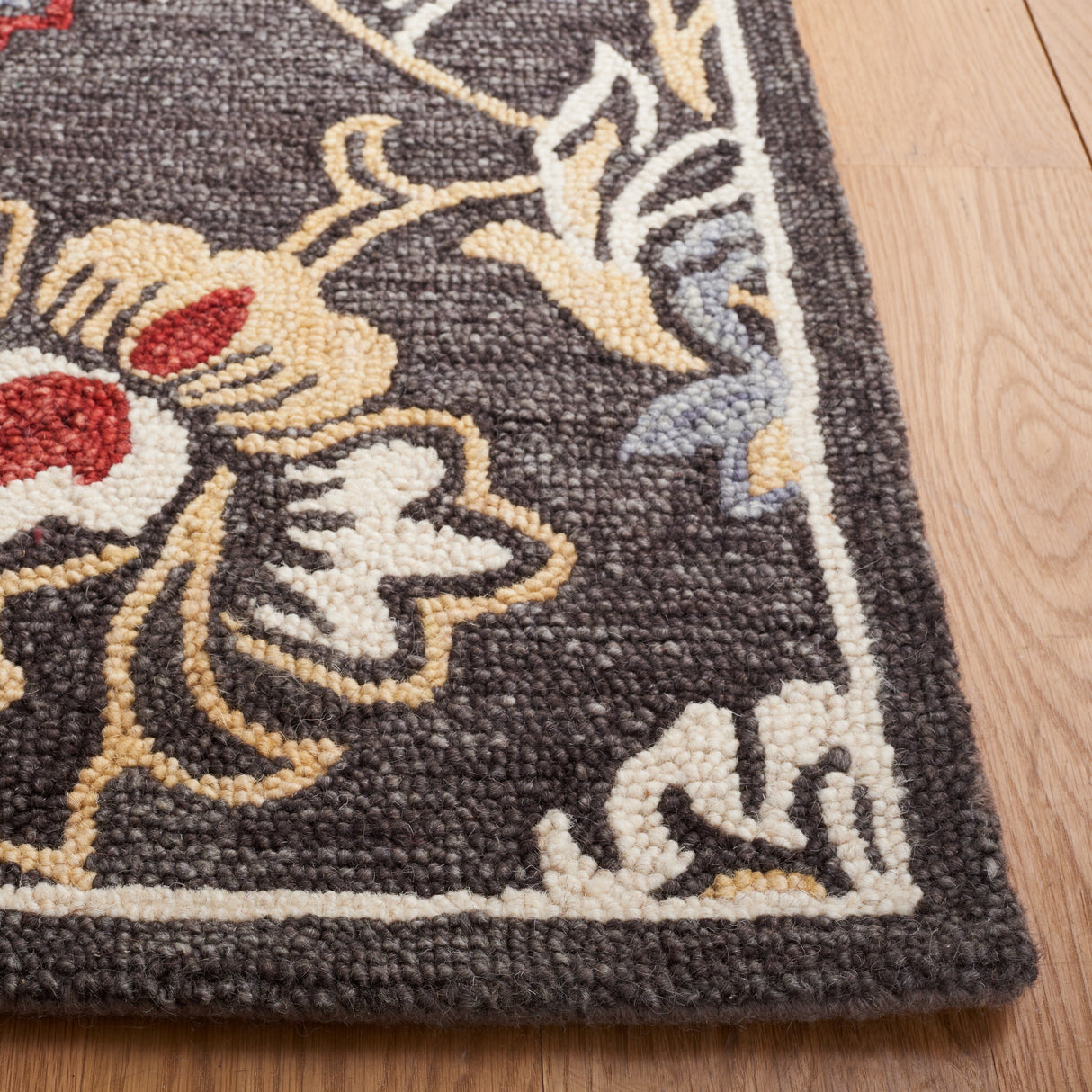 SAFAVIEH Handmade Blossom Anda Wool Rug