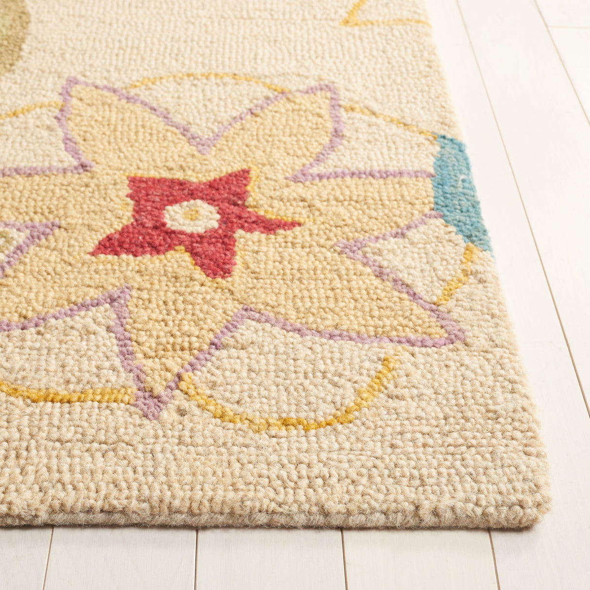 SAFAVIEH Handmade Blossom Dave Wool Rug