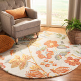 SAFAVIEH Handmade Blossom Hysnije Modern Floral Wool Rug