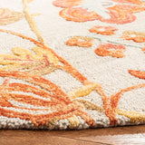 SAFAVIEH Handmade Blossom Hysnije Modern Floral Wool Rug