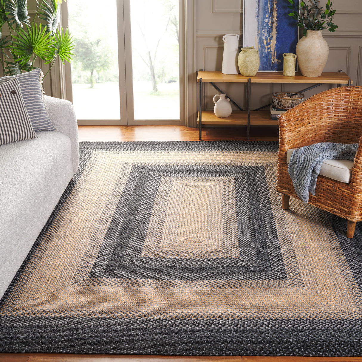 SAFAVIEH Handmade Braided Kita Country Rug