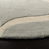 SAFAVIEH Handmade Cambridge Nenka Modern Wool Rug