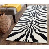 SAFAVIEH Handmade Cambridge Rikey Animal Print Wool Rug