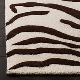 SAFAVIEH Handmade Cambridge Rikey Animal Print Wool Rug