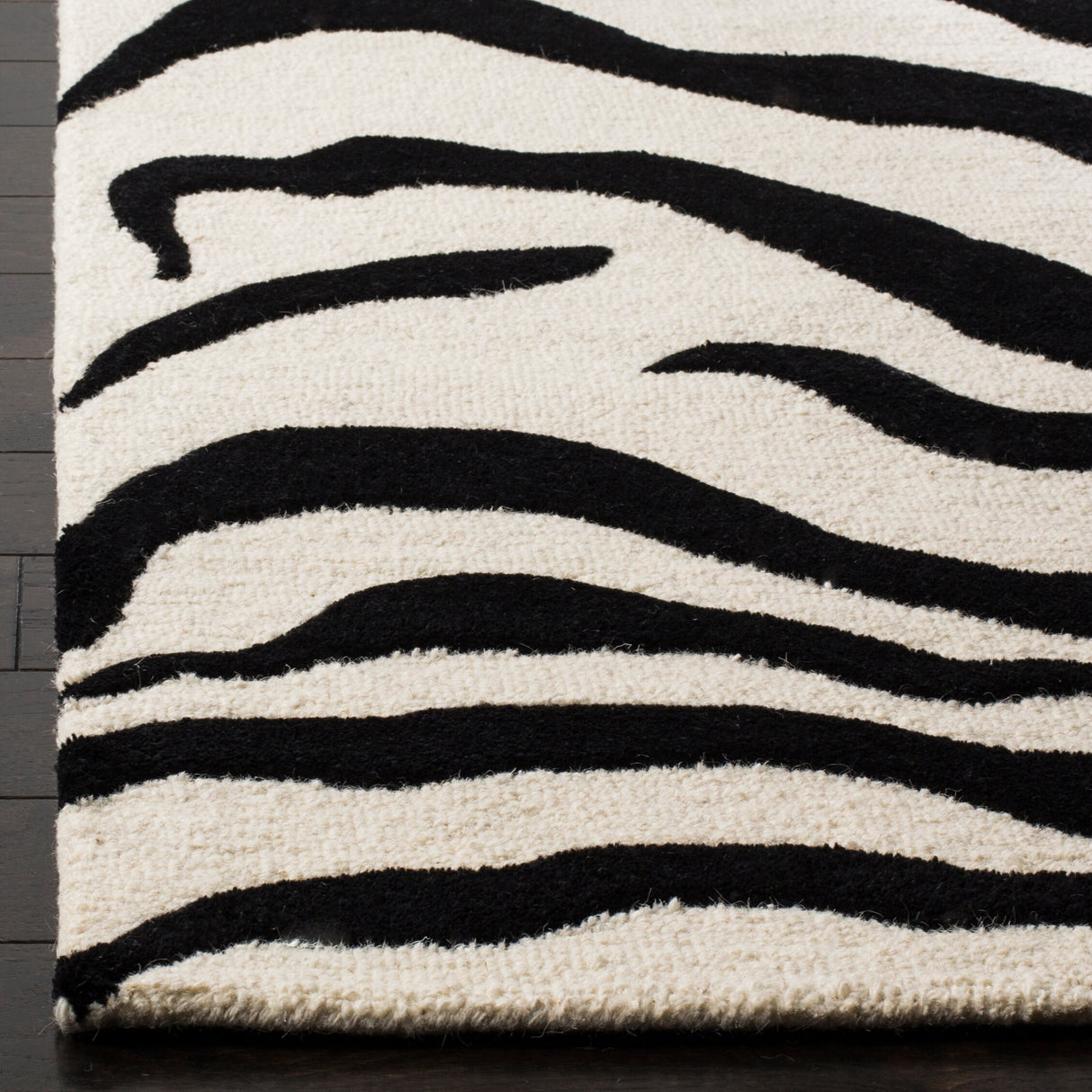 SAFAVIEH Handmade Cambridge Rikey Animal Print Wool Rug