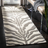 SAFAVIEH Handmade Cambridge Rikey Animal Print Wool Rug