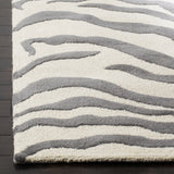 SAFAVIEH Handmade Cambridge Rikey Animal Print Wool Rug