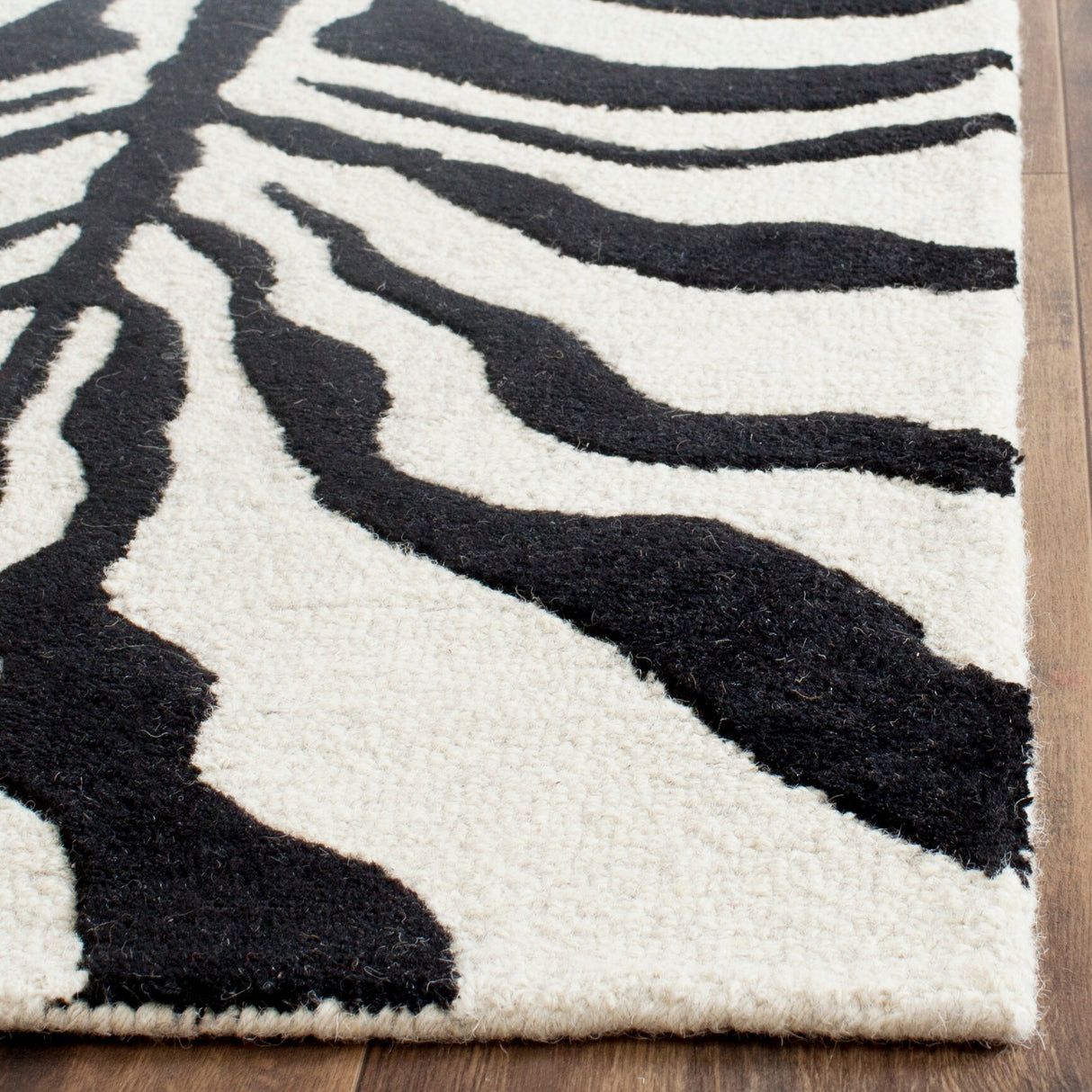 SAFAVIEH Handmade Cambridge Rikey Animal Print Wool Rug