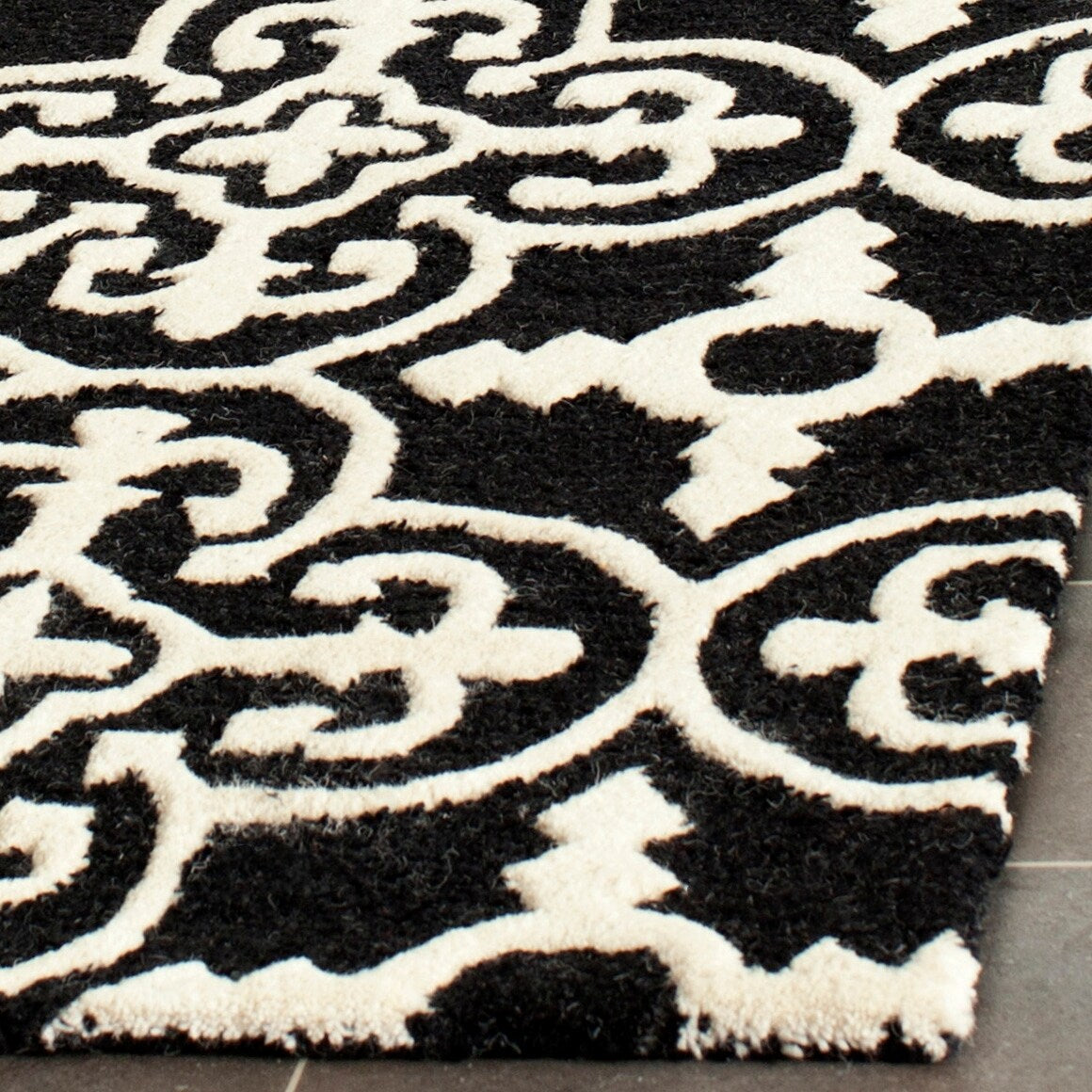 SAFAVIEH Handmade Cambridge Shigemi Modern Wool Rug