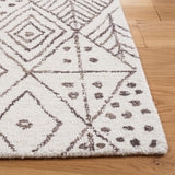 SAFAVIEH Handmade Casablanca Shag Crisitina Boho Wool Rug