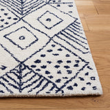 SAFAVIEH Handmade Casablanca Shag Crisitina Boho Wool Rug