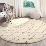 SAFAVIEH Handmade Casablanca Shag Dorette Tribal Wool Rug