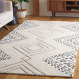 SAFAVIEH Handmade Casablanca Shag Dragulina Tribal Wool Rug