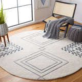 SAFAVIEH Handmade Casablanca Shag Dragulina Tribal Wool Rug