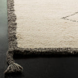 SAFAVIEH Handmade Casablanca Shag Oonagh Tribal Wool Rug