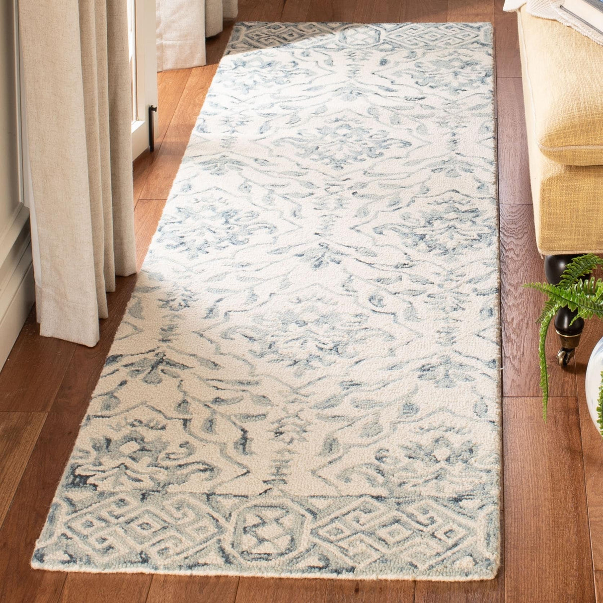 SAFAVIEH Handmade Dip Dye Elvedina Floral Wool Rug