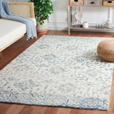 SAFAVIEH Handmade Dip Dye Elvedina Floral Wool Rug