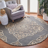 SAFAVIEH Handmade Dip Dye Emeteria Medallion Wool Rug