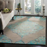 SAFAVIEH Handmade Dip Dye Emeteria Medallion Wool Rug