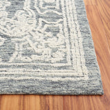 SAFAVIEH Handmade Ebony Tammy Modern Wool Rug