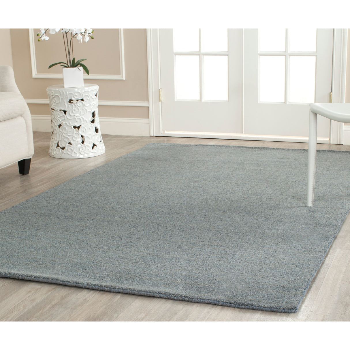 SAFAVIEH Handmade Himalaya Palm Border Modern Wool Rug