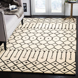 SAFAVIEH Handmade Himalaya Parasols Modern Wool Rug