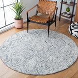 SAFAVIEH Handmade Ikat Lilija Wool Rug