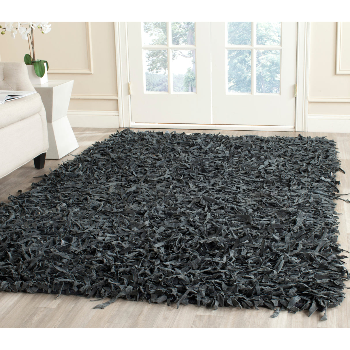 SAFAVIEH Handmade Leather Shag Doinita Modern Decorative Rug