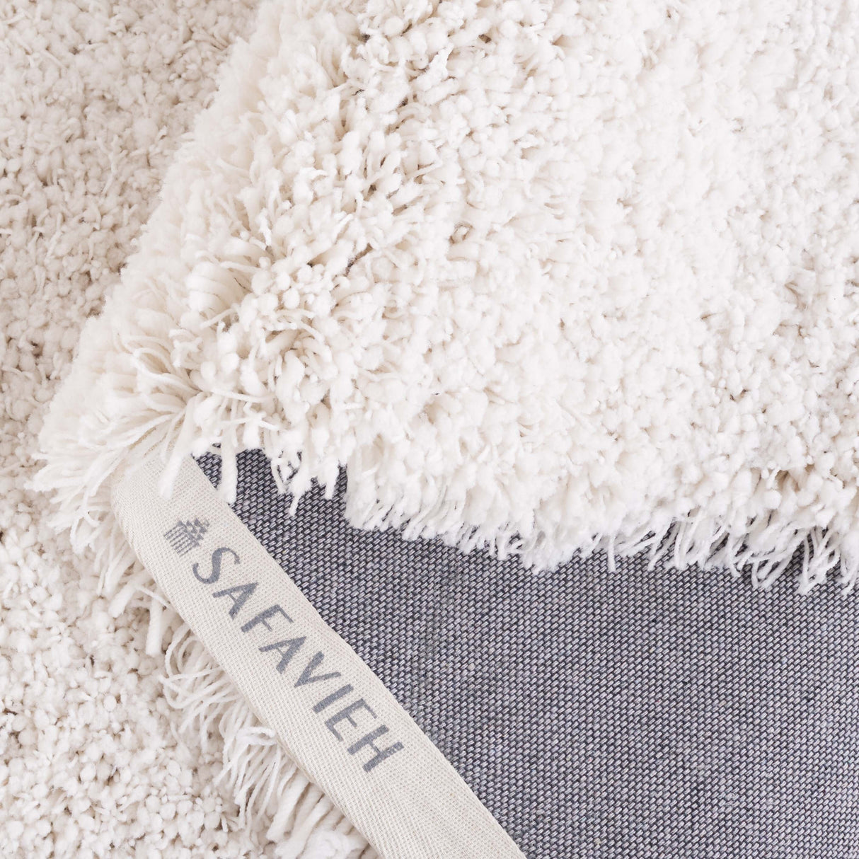 SAFAVIEH Handmade Luxe Gianna Gezina Shag Rug