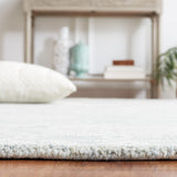 SAFAVIEH Handmade Micro-Loop Annkathrin Wool Rug