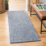 SAFAVIEH Handmade Micro-Loop Bunny Wool Rug