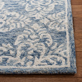 SAFAVIEH Handmade Micro-Loop Egne Wool Rug