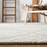 SAFAVIEH Handmade Micro-Loop Hyeong Wool Rug