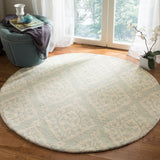 SAFAVIEH Handmade Micro-Loop Hyeong Wool Rug