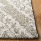 SAFAVIEH Handmade Micro-Loop Hyeong Wool Rug