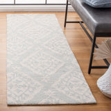 SAFAVIEH Handmade Micro-Loop Hyeong Wool Rug