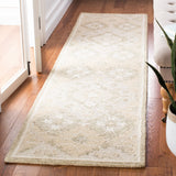 SAFAVIEH Handmade Micro-Loop Kleoniki Wool Rug